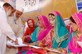 25 couples tie the knot at mass marriage ceremony under MWF