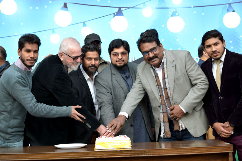 Christmas cake cut at Minhaj University Lahore